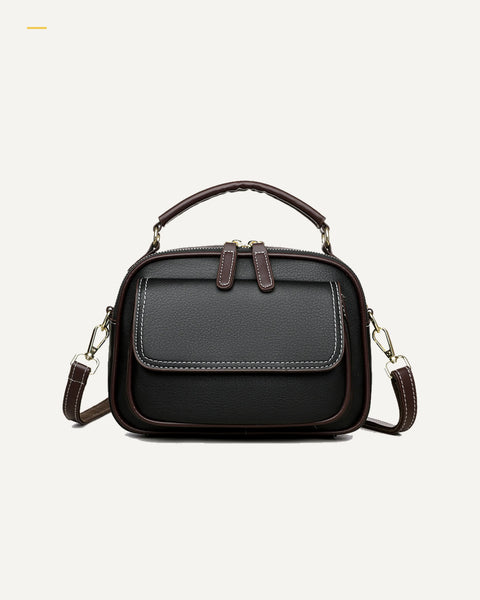 LunaBelle Crossbody-Tasche in Schwarz als Freisteller auf warmweißem Hintergrund.