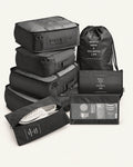 Das achtteilige PackSmart Reise-Organizer-Set von CARRYON X in Schwarz vor hellem Hintergrund.